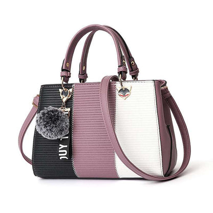 Women's Handbag Multicolored  with a fur pom-pom keychain on a white background