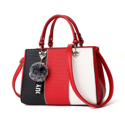 Women's Handbag Multicolored  with red, black, and white sections on a white background